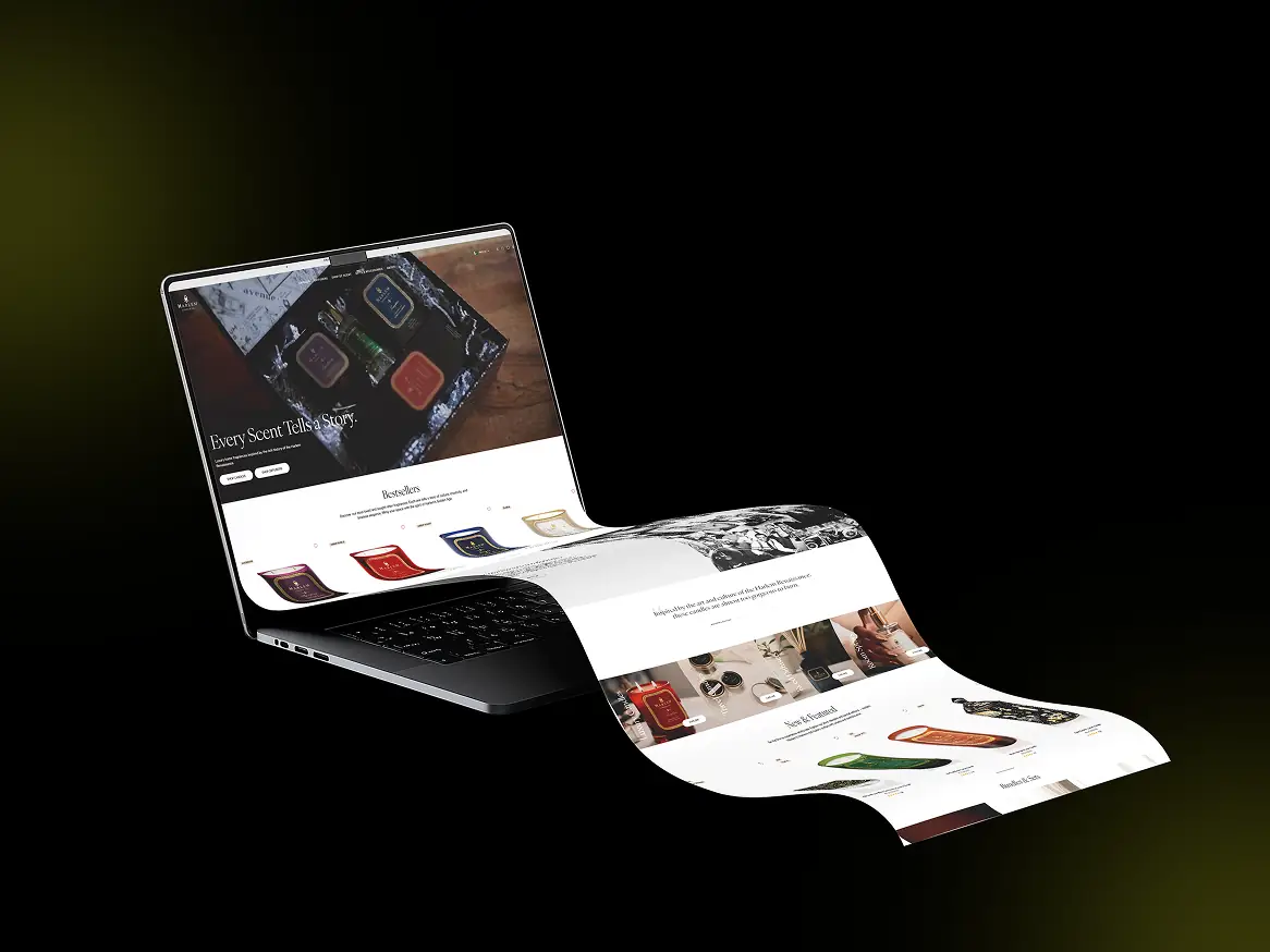 Custom Shopify store design for a fragrance and candle brand, displayed on laptop mockup, website homepage and product collection page by The Design Log